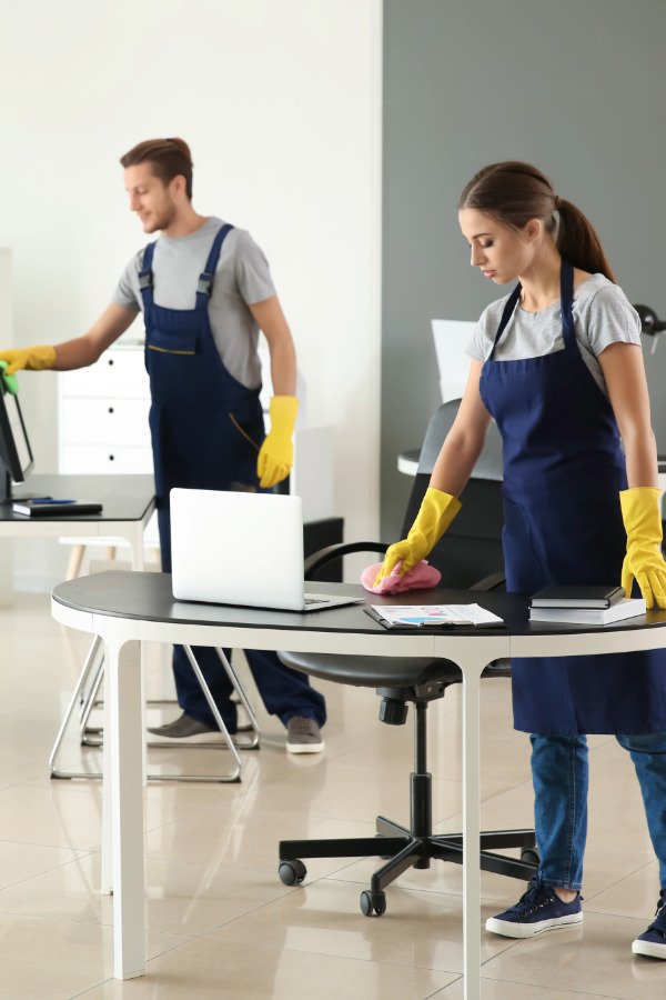 Professional cleaner cleaning a commercial office