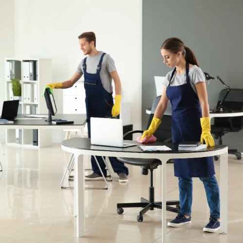 Professional cleaner cleaning a commercial office