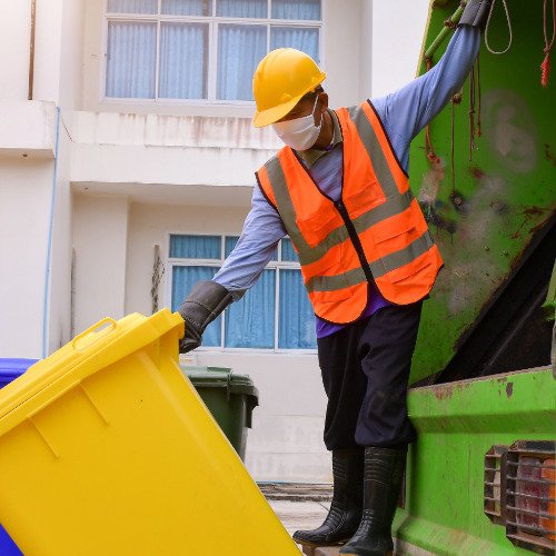 Professional cleaner providing carpet cleaning in a home